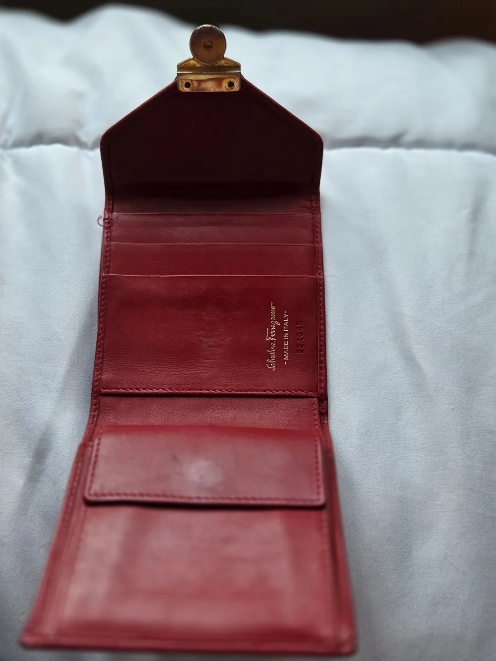 Red Leather Salvatore Ferragamo Wallet Featuring a Gold Gancini Clasp